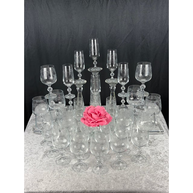 A rare and breathtaking 36‑piece complete stemware service in the Cascade pattern by Import Associates — a flowing, etched...
