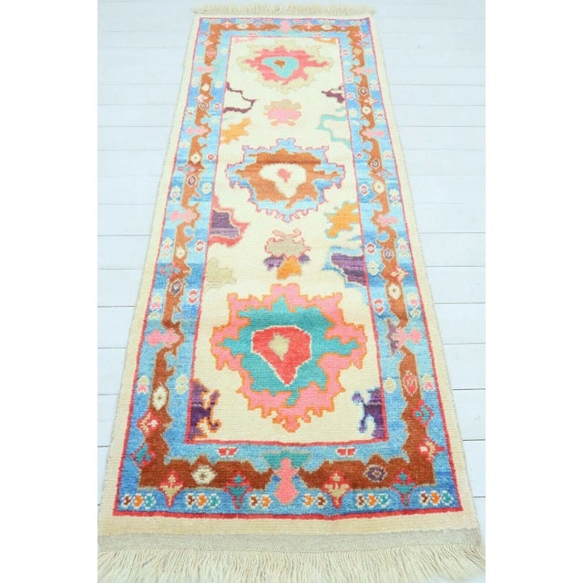 This beautiful, traditional vintage, hand knotted Turkish runner is approximately 60 years old. It is handmade of very...