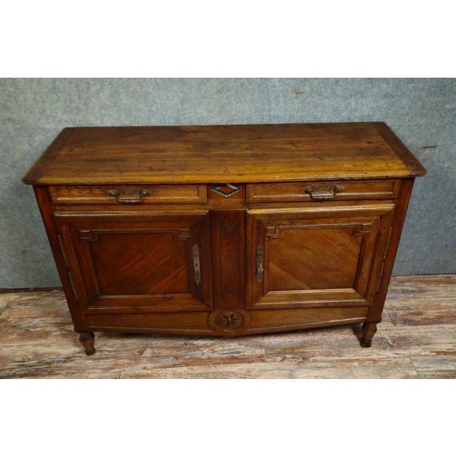 Low louis xv style solid wood sideboard, 18th century (provincial work) this low sideboard, crafted from solid wood,...