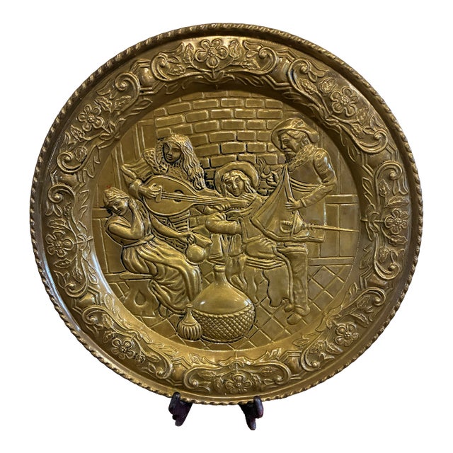 English Embossed Brass Decorative Wall Plate With Medieval Musicians Scene For Sale