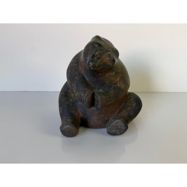 Charming vintage Raku pottery bear attributed to Tony Evans, featuring a beautifully hand-sculpted, rounded form with a...