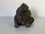 Charming vintage Raku pottery bear attributed to Tony Evans, featuring a beautifully hand-sculpted, rounded form with a...