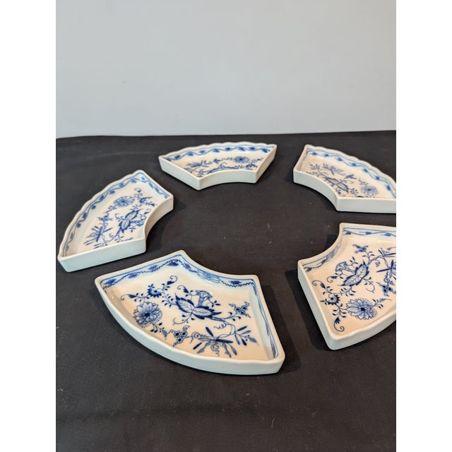 A rare antique Meissen Blue Onion (Zwiebelmuster) five-piece crescent-form serving set, designed to form a circular...