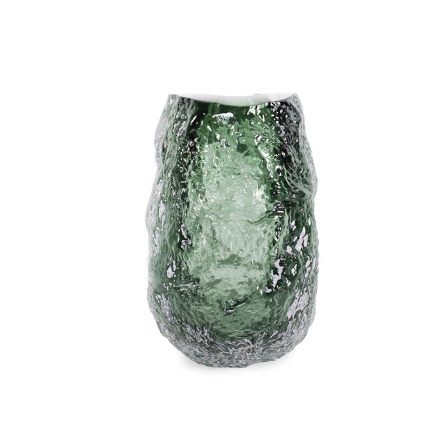 Featuring a sleek design and bright green tones, this piece stands out with its fluid, sculpted shape, making it a...
