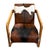 Deco style brown and white cow style goat hide arm chair. Natural finish teak wood frame. Each will be unique in natural...