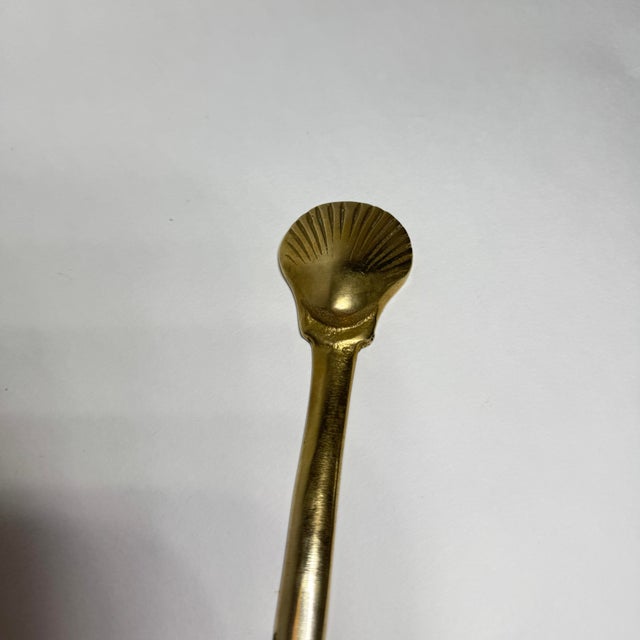 # Vintage Brass Shell Letter Opener - Mid-Century Elegance for the Discerning Collector This exquisite brass letter opener...