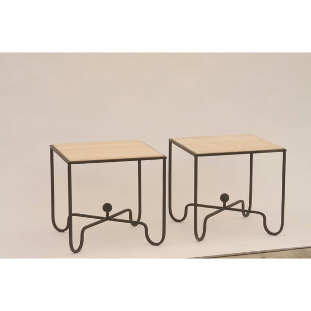 Pair of 'Entretoise' wrought iron and onyx side tables by Design Frères. Great as end tables or as a two-part coffee...
