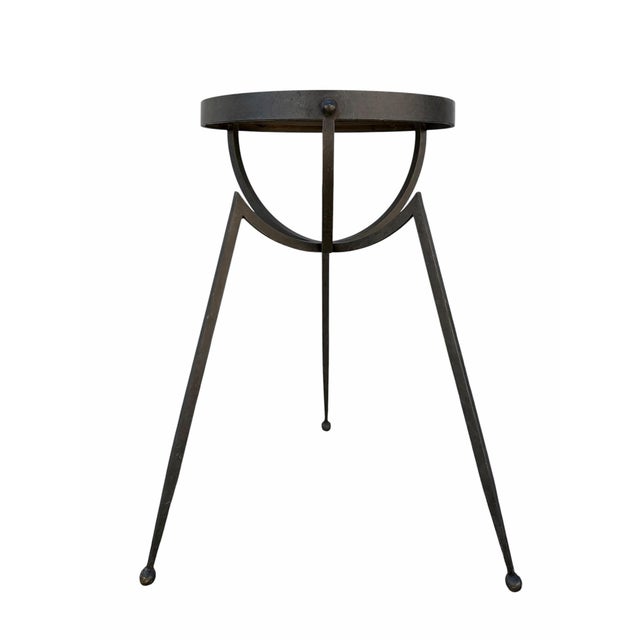 Barbara Barry for Baker Furniture wrought iron side table with an antiqued mirror tabletop. A unique piece adding a great...