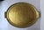 *Two available, each sold separately. An Italian oval gold giltwood serving tray with handles, circa late-20th century,...