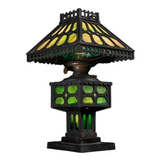 Early 20th Century Arts and Crafts Green Slag Glass and Cast Iron Table Lamp For Sale