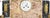 Clocks - Art Deco Garniture. French; circa 1940. Composed of a pair of candlesticks and a table clock in two-tone marble;...