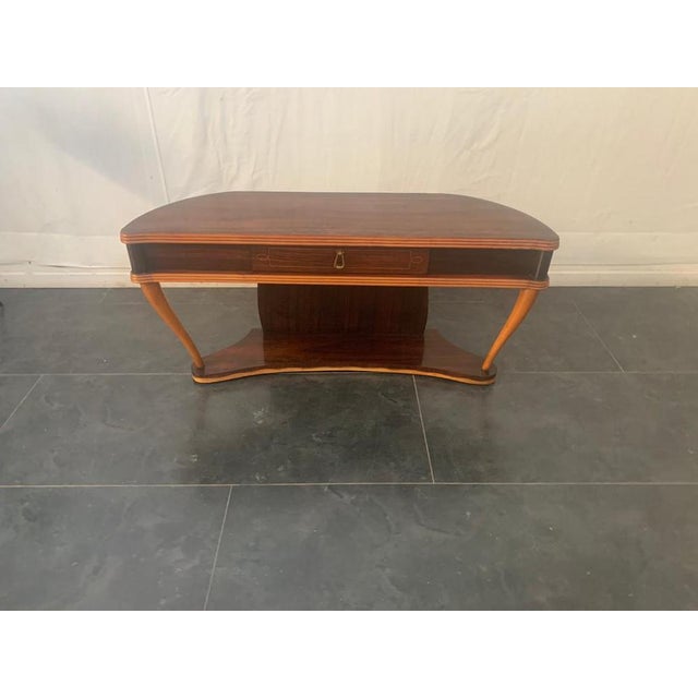 Rosewood Console Table by Paolo Buffa, 1940s, in Very Good conditions. Designed 1920 to 1949 This piece is designed in the...