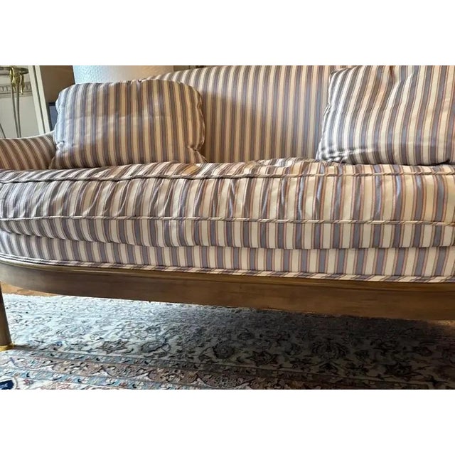 Offered is a vintage striped upholstery settee with removable down-filled seat cushion and accent pillows. This piece was...