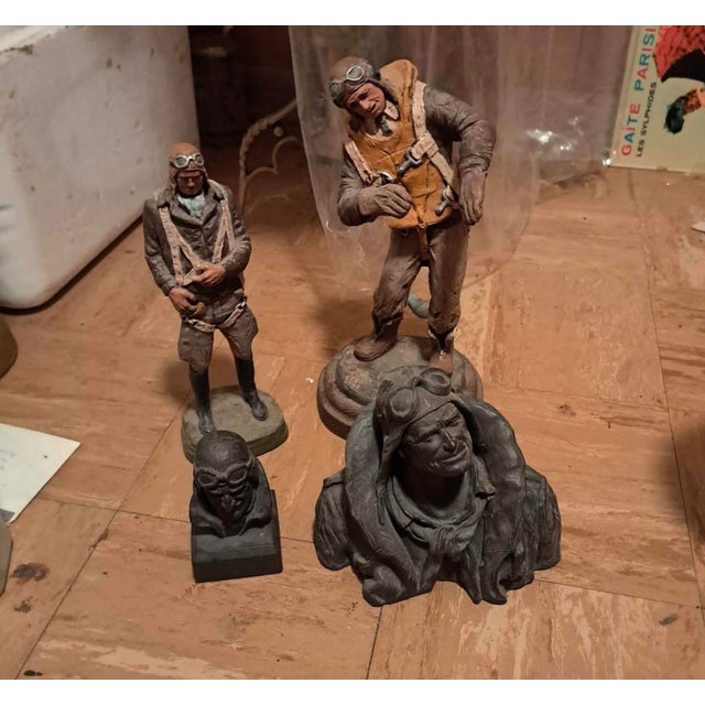 Complete Michael Garman Retired Aviator Collection featuring four aviation-themed sculptures, including two hand-painted...