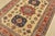 A tribal Caucasian Kazak rug hand-knotted with fine wool on a cotton foundation. This rug features geometric medallions...