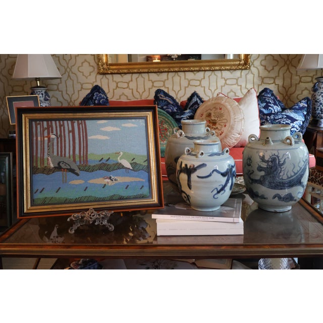 A charming vintage needlepoint that brings color, handcrafted texture, and personality to a collected room. Four waterside...