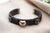 Gold Bracelet with a Heart-Shaped Paw Charm, in Worn conditions. Designed 1980 to 1989