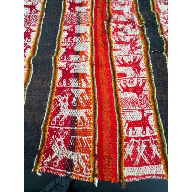 Beautiful antique Andean textile, alpaca wool manta or also a aguayo cloth from Peru. Vibrant colors are hand-loomed using...