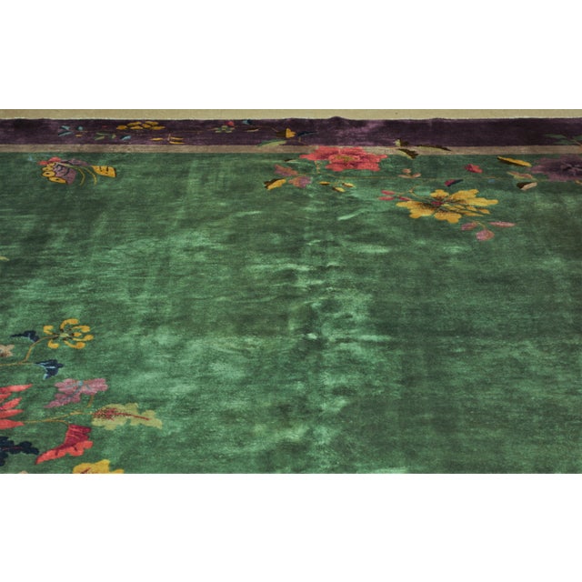 Hand-knotted with care using traditional rug-making techniques, this wool rug blends timeless craftsmanship with a modern...