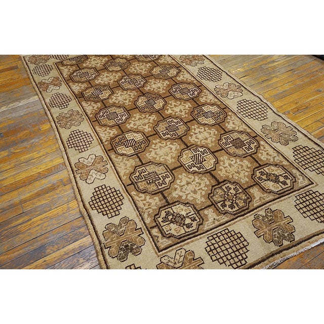 Antique Chinese Khotan rug, size: 4'8"x 8'2". Antique Khotan East Turkestan 1920s Rug, Country of Origin: East Turkestan,...