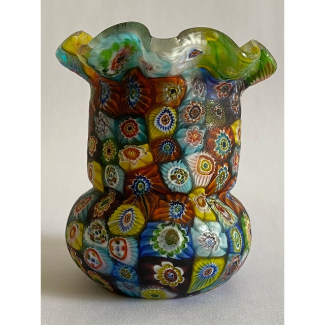A stunning midcentury Italian Murano glass millefiori toothpicks holder. The first picture was captured in bright sunlight.