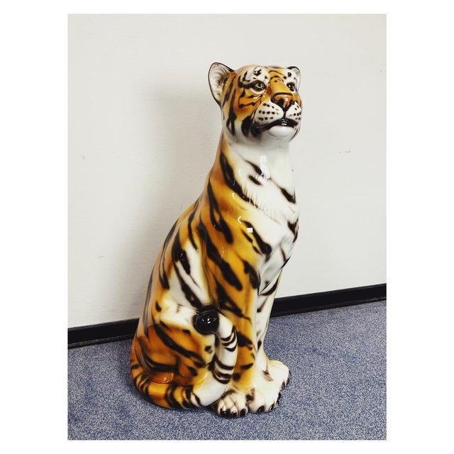 Unique handmade statue of a tiger. This Hollywood Regency statue, crafted from hand-painted ceramic and made in Italy,...