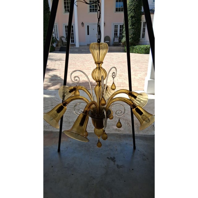 Exquisite 6-Light Murano Glass Venetian Chandelier This is a high-end, statement piece perfect for a dining room, grand...