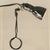 The lamp features an integrated spring mechanism: by pressing the wire frame and the ring together, it can be clamped onto...