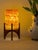 Comet pairs a hand-carved Egyptian alabaster shade with a geometric walnut base, combining contemporary form with...