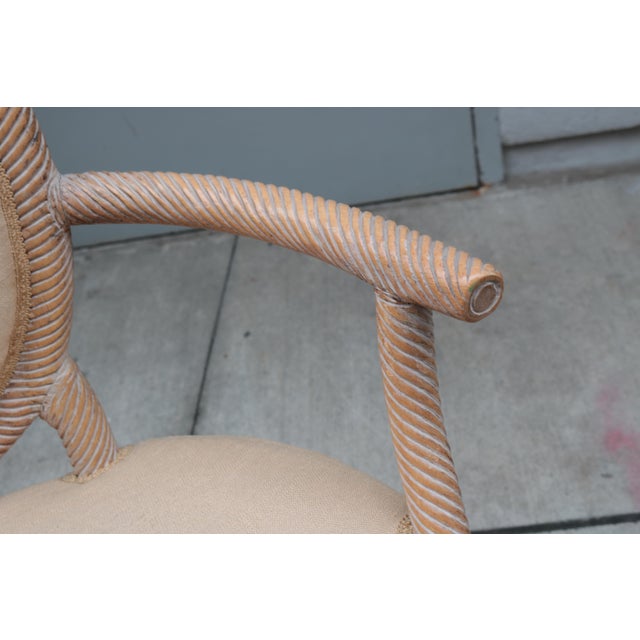 Pair of carved armchairs by Arpex. Carved wood details.