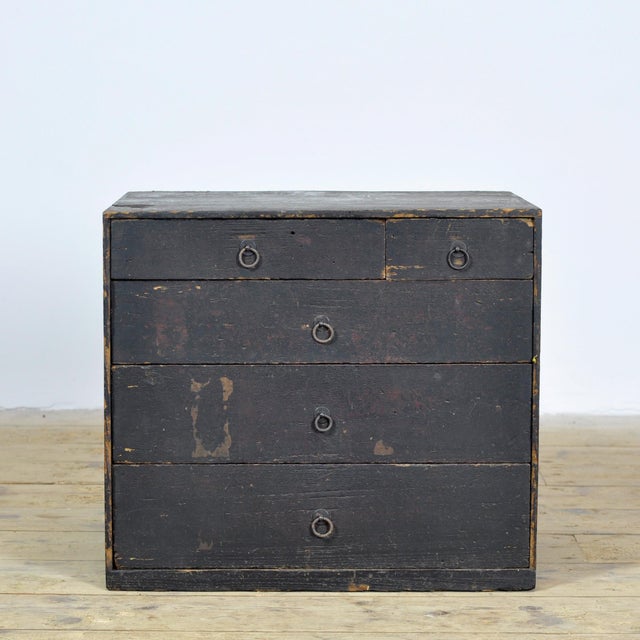 An atmospheric small Japanese *tansu*, designed as a compact *ko-dansu* with five drawers. The chest features...