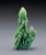 An impressive Chinese hand-carved jadeite sculpture depicting Guanyin, the revered bodhisattva of compassion and mercy,...