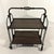 Brutalist handcrafted serving trolley. Wrought iron frame and iron table tops. The trolley can be very easily folded....