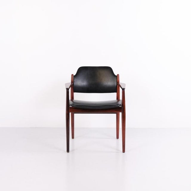 Pair of model 62a armchairs designed by arne vodder and manufactured by sibast furniture in the 1960s. The chairs are...