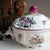 Add a burst of colour and charm to your dining table with this exquisite Antique Lunéville Soup Tureen. Hand-painted with...