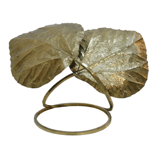 - Vintage table lamp - Designed by Tommaso Barbi - Composed of two leaves - Features a structure made of brass - Each leaf...