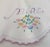A tender and deeply personal pair of mid-century heirloom pillowcases, beautifully hand embroidered with the words "Mine"...