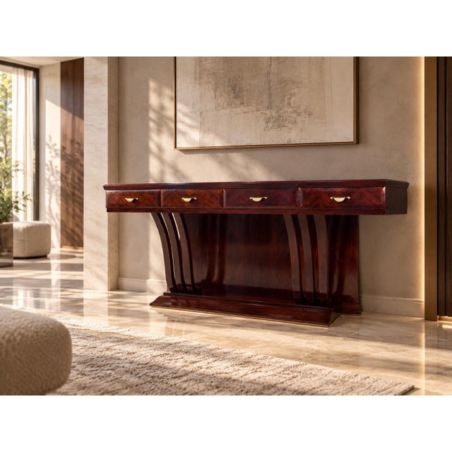 Elegant Italian console dating from the 1940s, attributed to Osvaldo Borsani, distinguished by its strongly architectural...