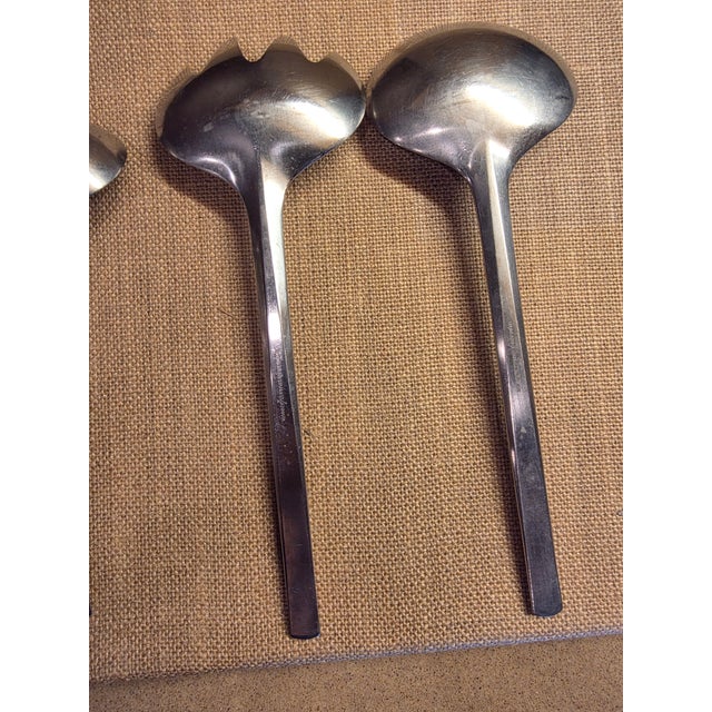 Great looking stainless steel salad serving utensils two large spoons and two larger forks and one other piece for gravy...