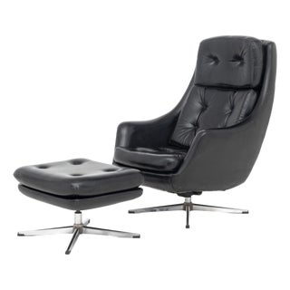 Overman Black Vinyl Lounge Chair and Ottoman For Sale