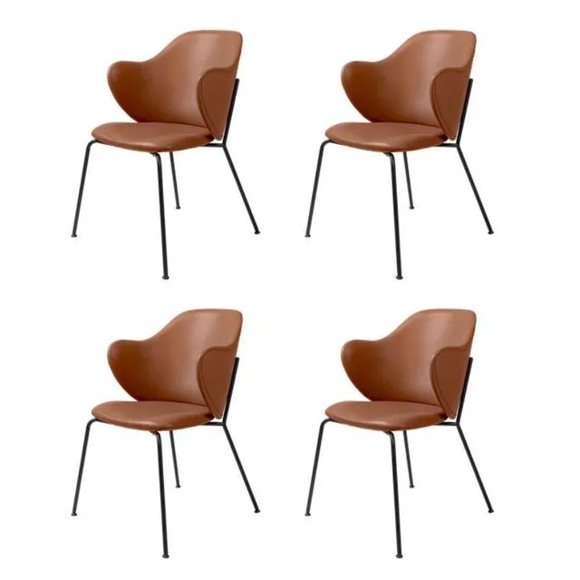 Set of 4 brown leather lassen chairs by Lassen. Dimensions: W 58 x D 60 x H 88 cm. Materials: Leather. The Lassen chair by...