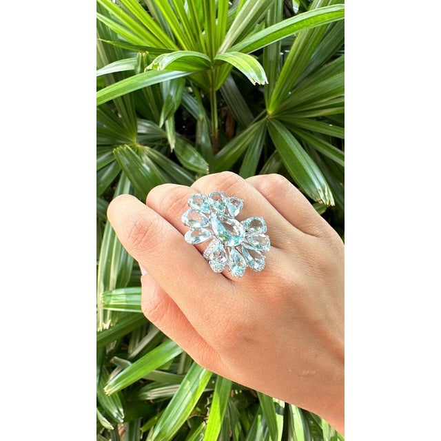 A very gorgeous and beautiful, modern style, Aquamarine over-sized Cocktail Ring set in 18K White Gold & natural Diamonds....