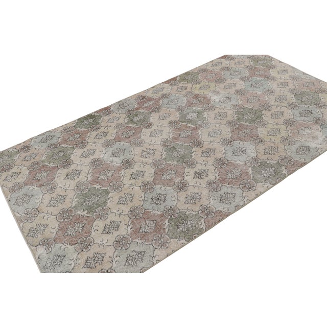 Handknotted in wool, this 5x8 vintage Art Deco rug originates from Turkey, circa 1960-1970, and is believed to be among...