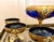 Vintage Venetian Tre-Fuochi Murano Dessert Set with Fruit Goblet and Coupes in Cobalt Blue and 24kt Gold-Plated Enamel, 1920s, Set of 7 For Sale - Image 4 of 9