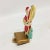 Vintage Christmas Stocking Hanger with Santa Claus holding decoration with his sack at his feet
