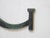 This bronze letter 'G' is from old signage.