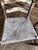 Pair of Early 20th Century Rush Seat Ladderback Side Chairs With Distressed White Chippy Paint Finish For Sale - Image 10 of 12