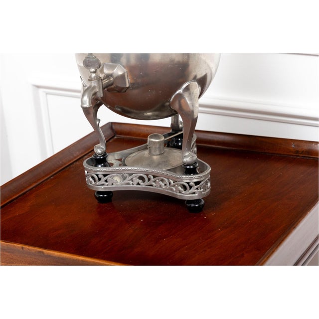 A unique late 19th century Victorian pewter samovar crafted by Royal Holland. Includes the original reticulated stand and...