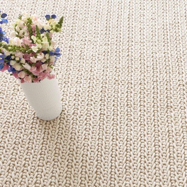 Look closely: the chunky texture and organic look of this rug is just like jute. But it's actually scrubbable, hoseable,...