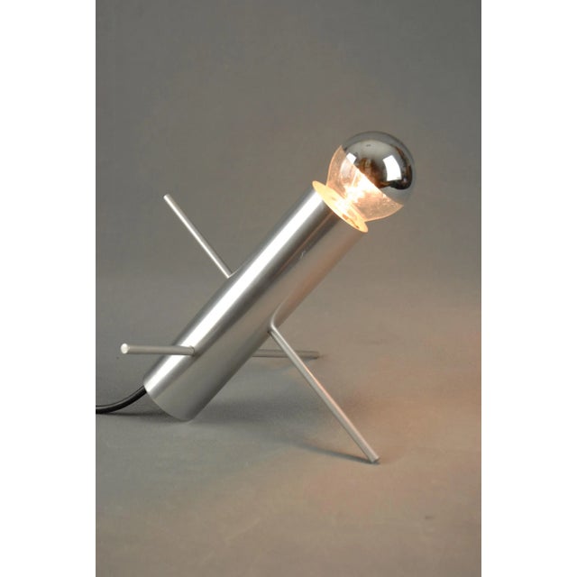 The Cricket Lamp, model R-60, was designed in 1962 by Otto Wasch for RAAK, Amsterdam. The lamp consists of a brushed...